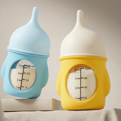 Chatons biberon comparatif tailles 20 ml 80 ml silicone ergonomique avec lait d'allaitement