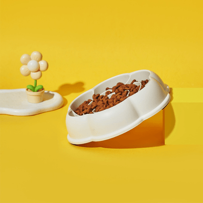 Gamelle anti glouton chaton blanche forme rose avec croquettes MealStop™