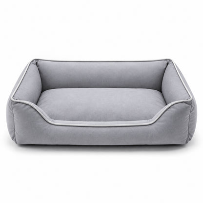 Lit chat gris rembourré avec coussin généreux et rebords de maintien