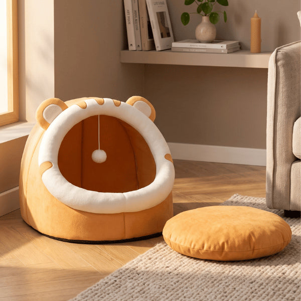 Maisonnette pour chat orange avec coussin amovible facilitant entretien et confort toute saison